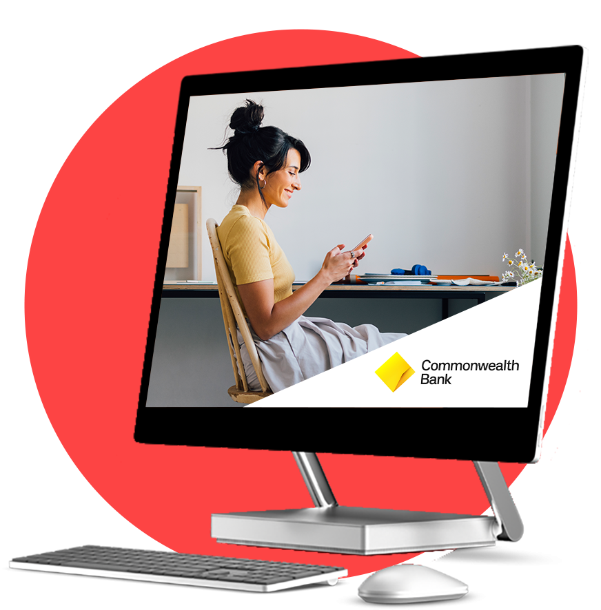 Woman in yellow looking at computer